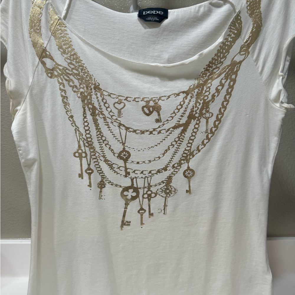Bebe creme colored blouse